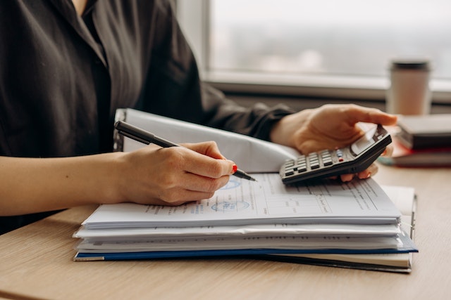 person using a calculator